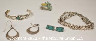 Group of Sterling silver Jewelry Including Native American Bracelet. 