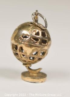 Vintage Pierced Articulated World Globe Charm or Pendant. 