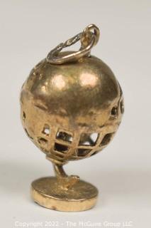 Vintage Pierced Articulated World Globe Charm or Pendant. 