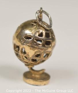 Vintage Pierced Articulated World Globe Charm or Pendant. 