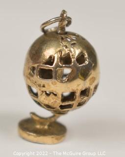 Vintage Pierced Articulated World Globe Charm or Pendant. 