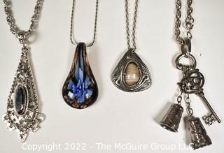 Four (4) Pendant Style Necklaces. 