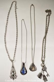 Four (4) Pendant Style Necklaces. 