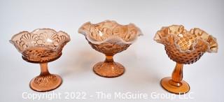 Three (3) Fenton Amber Ruffled Edge Glass Compote Style Pedestal Dish Including Hobnail.