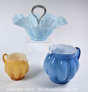 Three (3) Fenton Art Glass in Beaded Melon Pattern in Blue and Yellow.  Includes Two Pitchers or Creamers and Ruffle Edge Serving Dish. 