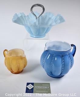 Three (3) Fenton Art Glass in Beaded Melon Pattern in Blue and Yellow.  Includes Two Pitchers or Creamers and Ruffle Edge Serving Dish. 