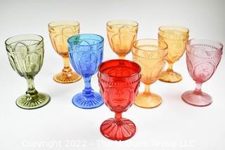 Eight (8) Fenton Art Glass Pedestal Style Goblets in Green, Peach, Blue, Pink and Ruby Red .  