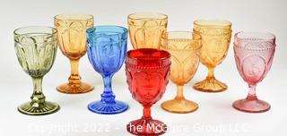 Eight (8) Fenton Art Glass Pedestal Style Goblets in Green, Peach, Blue, Pink and Ruby Red .  