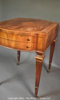 Two Drawer Sheraton Style Mahogany End Table With Inlay And Brass Pulls.  Damage to finish.  27"L x 27"H x 20"W