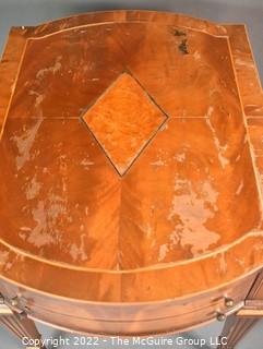 Two Drawer Sheraton Style Mahogany End Table With Inlay And Brass Pulls.  Damage to finish.  27"L x 27"H x 20"W