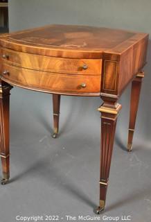 Two Drawer Sheraton Style Mahogany End Table With Inlay And Brass Pulls. Damage to finish. 27"L x 27"H x 20"W