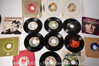 Collection Vintage 45 RPM Vinyl Records including Queen, The Doobie Brothers, Tony Orlando and Dawn, The Byrds, Rolf Harris, Queen, The Elton John Band, Bobby Sherman, Bette Midler, Dionne Warwick, Don Mclean - American Pie, Captain & Tennille, Tom Jones, Carpenters, Etc.