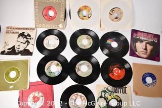 Collection Vintage 45 RPM Vinyl Records including Queen, The Doobie Brothers, Tony Orlando and Dawn, The Byrds, Rolf Harris, Queen, The Elton John Band, Bobby Sherman, Bette Midler, Dionne Warwick, Don Mclean - American Pie, Captain & Tennille, Tom Jones, Carpenters, Etc.