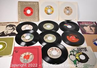 Collection Vintage 45 RPM Vinyl Records including Queen, The Doobie Brothers, Tony Orlando and Dawn, The Byrds, Rolf Harris, Queen, The Elton John Band, Bobby Sherman, Bette Midler, Dionne Warwick, Don Mclean - American Pie, Captain & Tennille, Tom Jones, Carpenters, Etc.