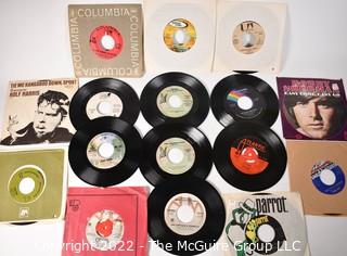 Collection Vintage 45 RPM Vinyl Records including Queen, The Doobie Brothers, Tony Orlando and Dawn, The Byrds, Rolf Harris, Queen, The Elton John Band, Bobby Sherman, Bette Midler, Dionne Warwick, Don Mclean - American Pie, Captain & Tennille, Tom Jones, Carpenters, Etc.