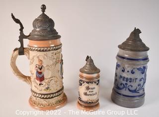 Collection of Three (3) German Steins with Hinged Pewter Lids. 