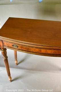 Bookmatched walnut top gateleg gaming table.  Measures 36"W x 31"T x 15.5" (closed) and 31" (open)