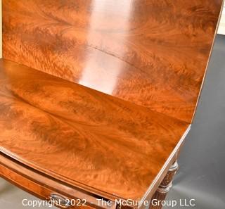 Bookmatched walnut top gateleg gaming table.  Measures 36"W x 31"T x 15.5" (closed) and 31" (open)