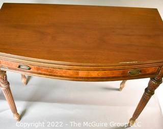 Bookmatched walnut top gateleg gaming table.  Measures 36"W x 31"T x 15.5" (closed) and 31" (open)