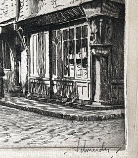 Framed Streetscape engraving in Black and White. Possibly German. Writing on lower margin.  Image Measures 6 x 11". With frame, 13.5 x 18.5" 