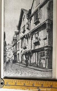 Framed Streetscape engraving in Black and White. Possibly German. Writing on lower margin.  Image Measures 6 x 11". With frame, 13.5 x 18.5" 