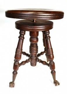 Victorian Piano Stool with Claw Feet Holding Glass Ball. 20" tall.