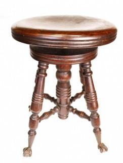 Victorian Piano Stool with Claw Feet Holding Glass Ball. 20" tall.