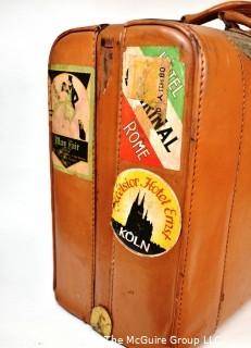 Vintage Saddle Leather Suitcase with Travel Stickers