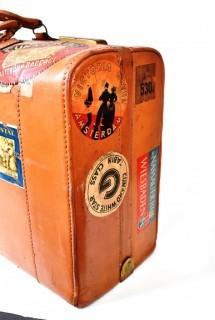 Vintage Saddle Leather Suitcase with Travel Stickers