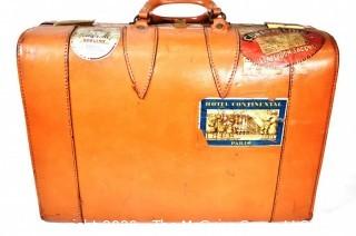 Vintage Saddle Leather Suitcase with Travel Stickers