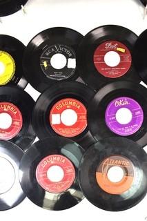 Collection of Vintage 45 Vinyl Records Including Nat King Cole, Four Aces, Fats Domino and Elvis Presley