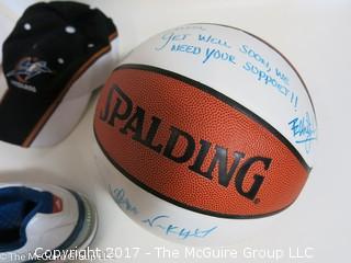 Assortment of sport collectibles including Wizards Jersey signed by Juan Dixon, signed shoe, signed basketball by various Washington Wizards and caps 