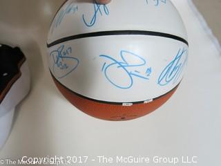 Assortment of sport collectibles including Wizards Jersey signed by Juan Dixon, signed shoe, signed basketball by various Washington Wizards and caps 