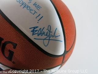 Assortment of sport collectibles including Wizards Jersey signed by Juan Dixon, signed shoe, signed basketball by various Washington Wizards and caps 