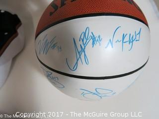 Assortment of sport collectibles including Wizards Jersey signed by Juan Dixon, signed shoe, signed basketball by various Washington Wizards and caps 