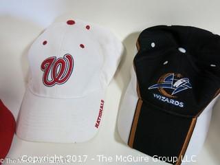 Assortment of sport collectibles including Wizards Jersey signed by Juan Dixon, signed shoe, signed basketball by various Washington Wizards and caps 