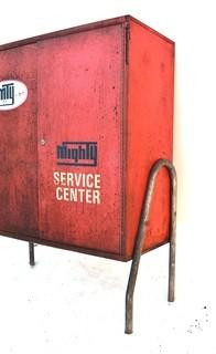 Vintage Red MTY Mighty Service Center Metal Garage Service Station Cabinet.  Includes mystery contents.  No key 13" x 32" x 41".