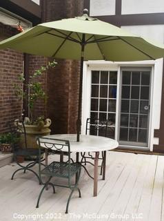 Outdoor Garden Table with Three (3) Cast Iron Chairs and Umbrella.   46" diameter.