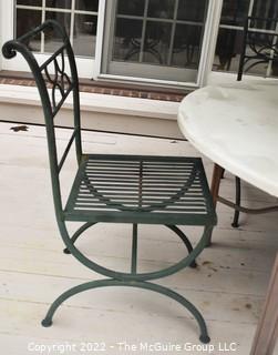 Outdoor Garden Table with Three (3) Cast Iron Chairs and Umbrella.   46" diameter.