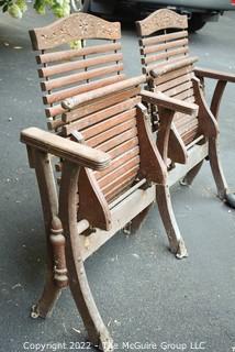 Antique Wood Slat Double Seat Folding Theater Chairs with Carved Back. Metal foot brackets for mounting. 49"L x 32"T 