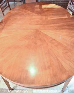 Bookmatched Veneer Dining Table with Four (4) Spindle Back Chairs.    42"W x 68"L  Includes two leaves 16"W each. 