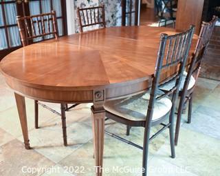 Bookmatched Veneer Dining Table with Four (4) Spindle Back Chairs.    42"W x 68"L  Includes two leaves 16"W each. 