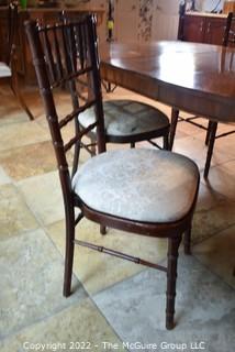 Bookmatched Veneer Dining Table with Four (4) Spindle Back Chairs.    42"W x 68"L  Includes two leaves 16"W each. 