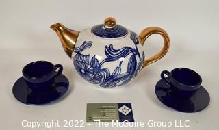 Ruan Hoffmann for Anthropologie Jardin Des Plantes Blue White Gold LOVE Teapot with Two (2) Coordinating Blue Teacups and Saucers. 