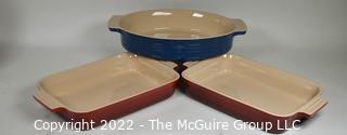 Three (3) Le Creuset Stoneware Baking Dishes including Oval Au Gratin