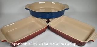 Three (3) Le Creuset Stoneware Baking Dishes including Oval Au Gratin