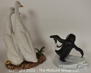 Two Hand Painted Porcelain Figurines Including Indian Running Ducks by T Jones by Royal Crown and Whoops Penguin by Michelle Emblem