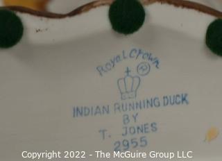 Two Hand Painted Porcelain Figurines Including Indian Running Ducks by T Jones by Royal Crown and Whoops Penguin by Michelle Emblem