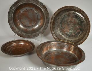 Set of Four (4) Primitive Hammered Copper Plates or Bowls. 