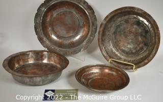 Set of Four (4) Primitive Hammered Copper Plates or Bowls. 